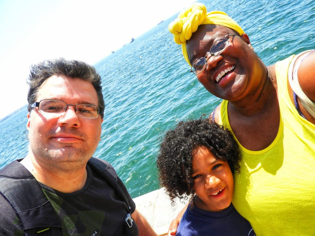 Head Chef Karen M. Ricks and family on a boat while traveling the world full-time